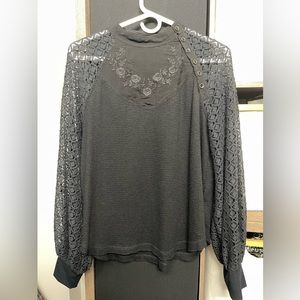 Free people black lace blouse. Size Medium.